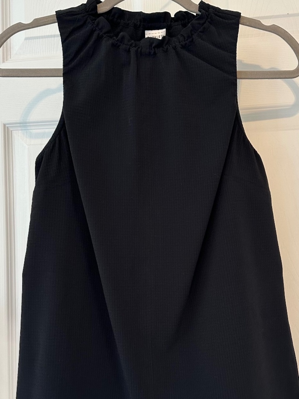 Athleta Black Ruffle Neck Drawstring Top XXS